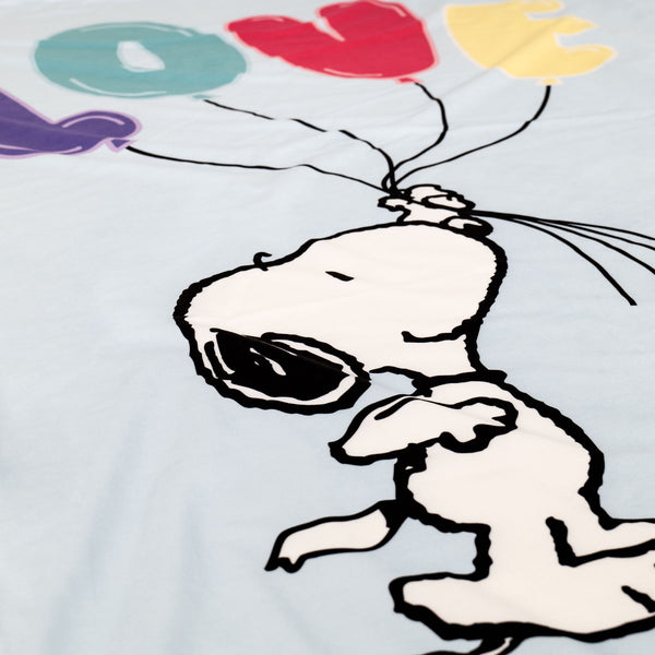 Charlie Brown y Snoopy Manta de Sofá - Globos Amor Fabric Close-up Image